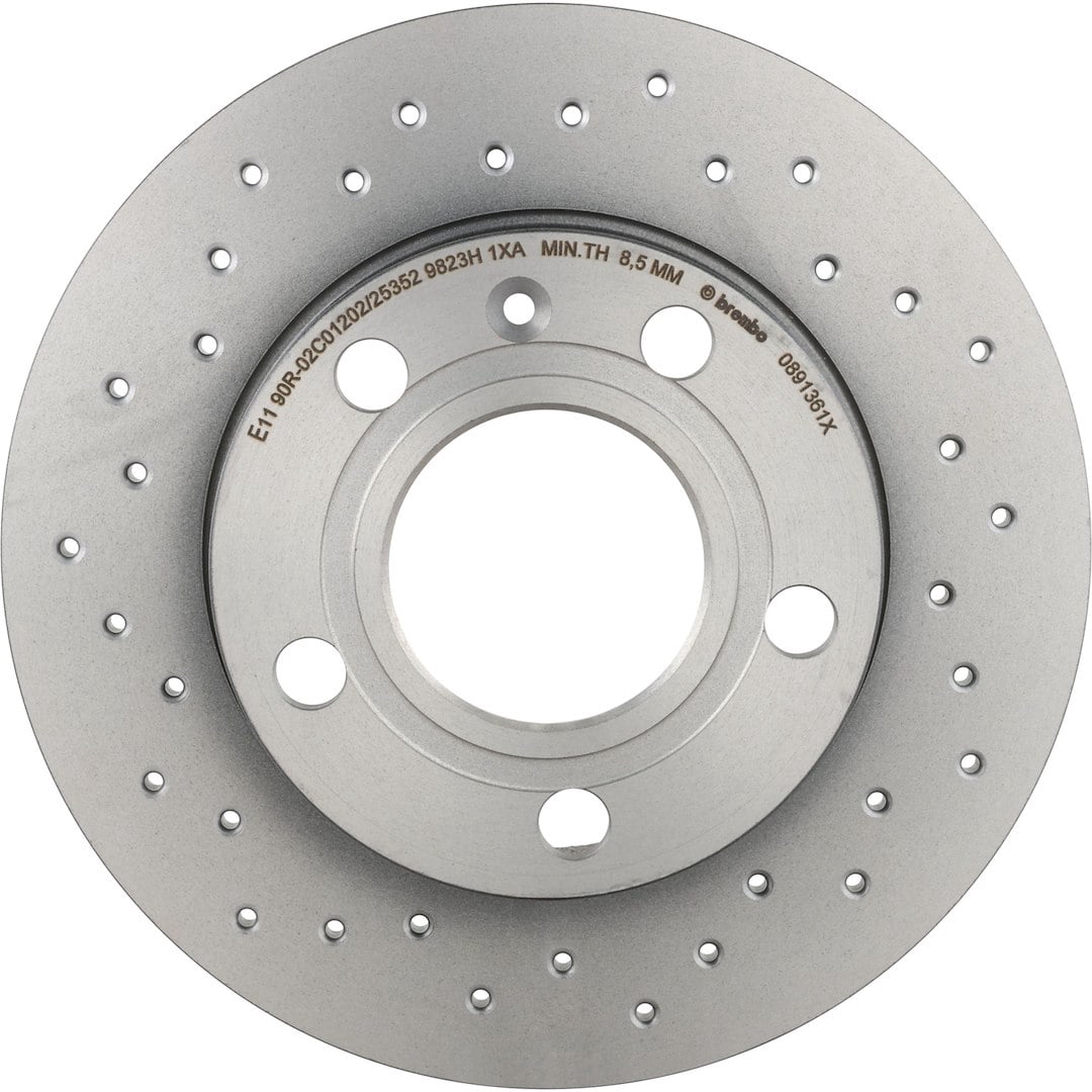 Brembo KTX0096; Brake Kit; Ceramic Brake Pads; 245 Millimeter Xtra Solid Cross Drilled High Carbon Cast Iron One Piece Rotor; With Rotors/ Pads/ Anti-Rattle Spring/ Mounting Hardware