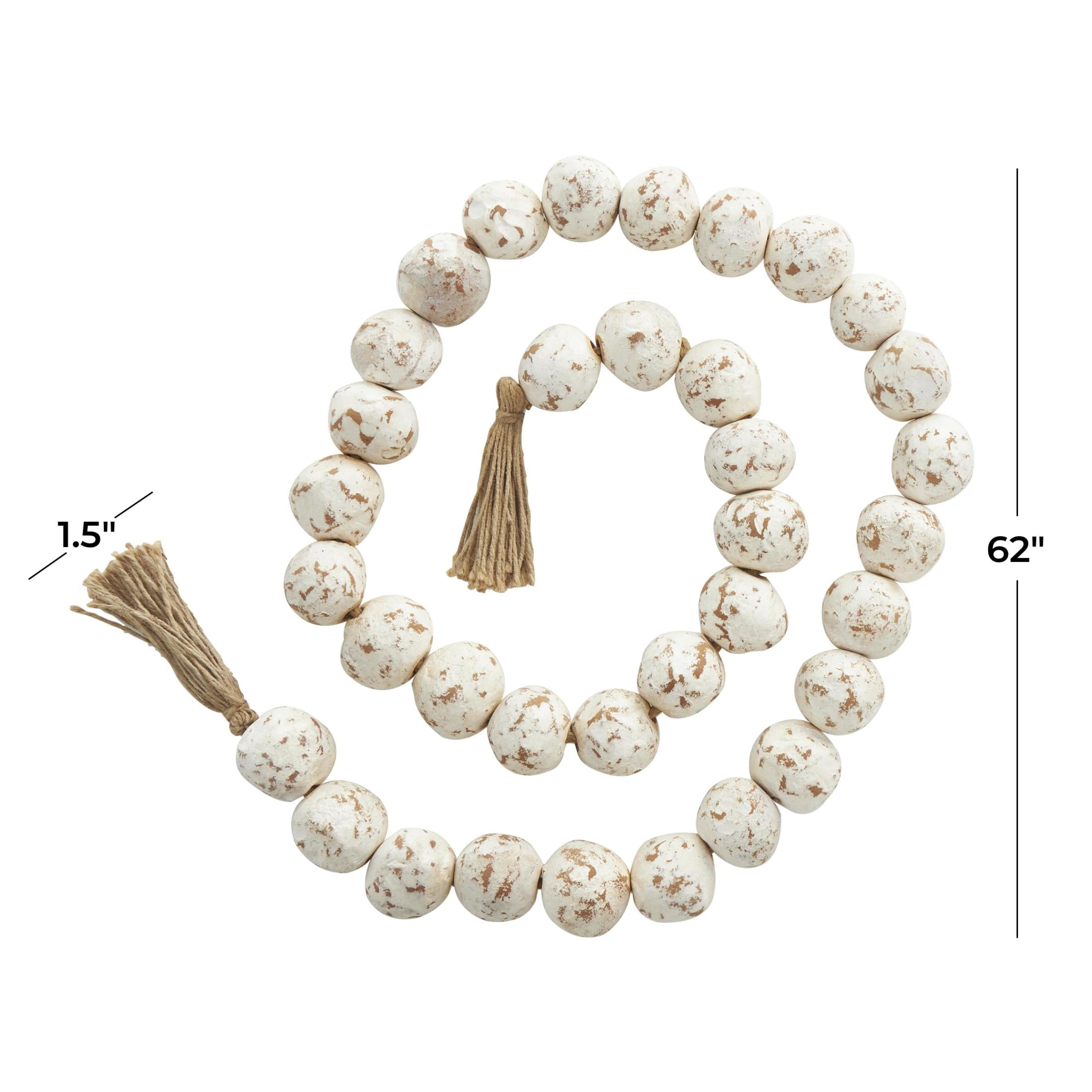 DecMode Handmade Round Intricately Shaped Large Distressed White Ceramic Garland with Tassel