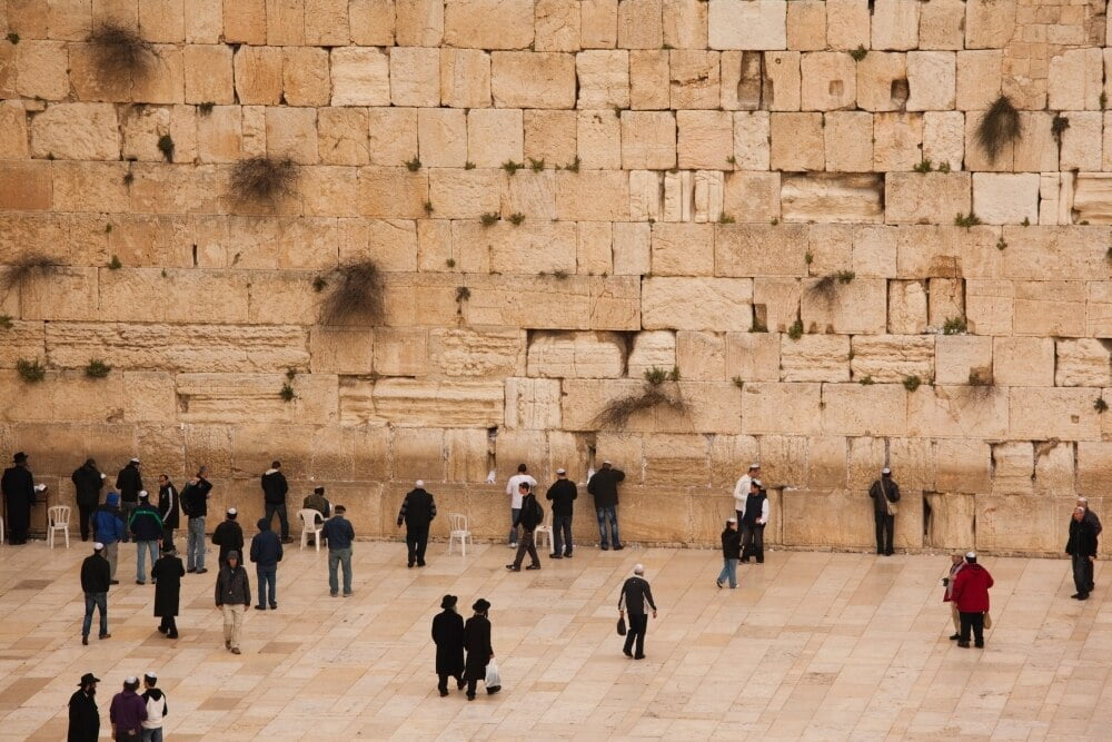 Elevated view of the Western Wall Plaza with people praying at the