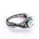 thumbnail image 4 of JeenMata Anillo de Compromiso con Diseño Único de Infinito de Piedra Lunar y Moissanita de Corte Redondo de 1,5 Quilates en Oro Negro de 18 K sobre Plata, 4 of 6