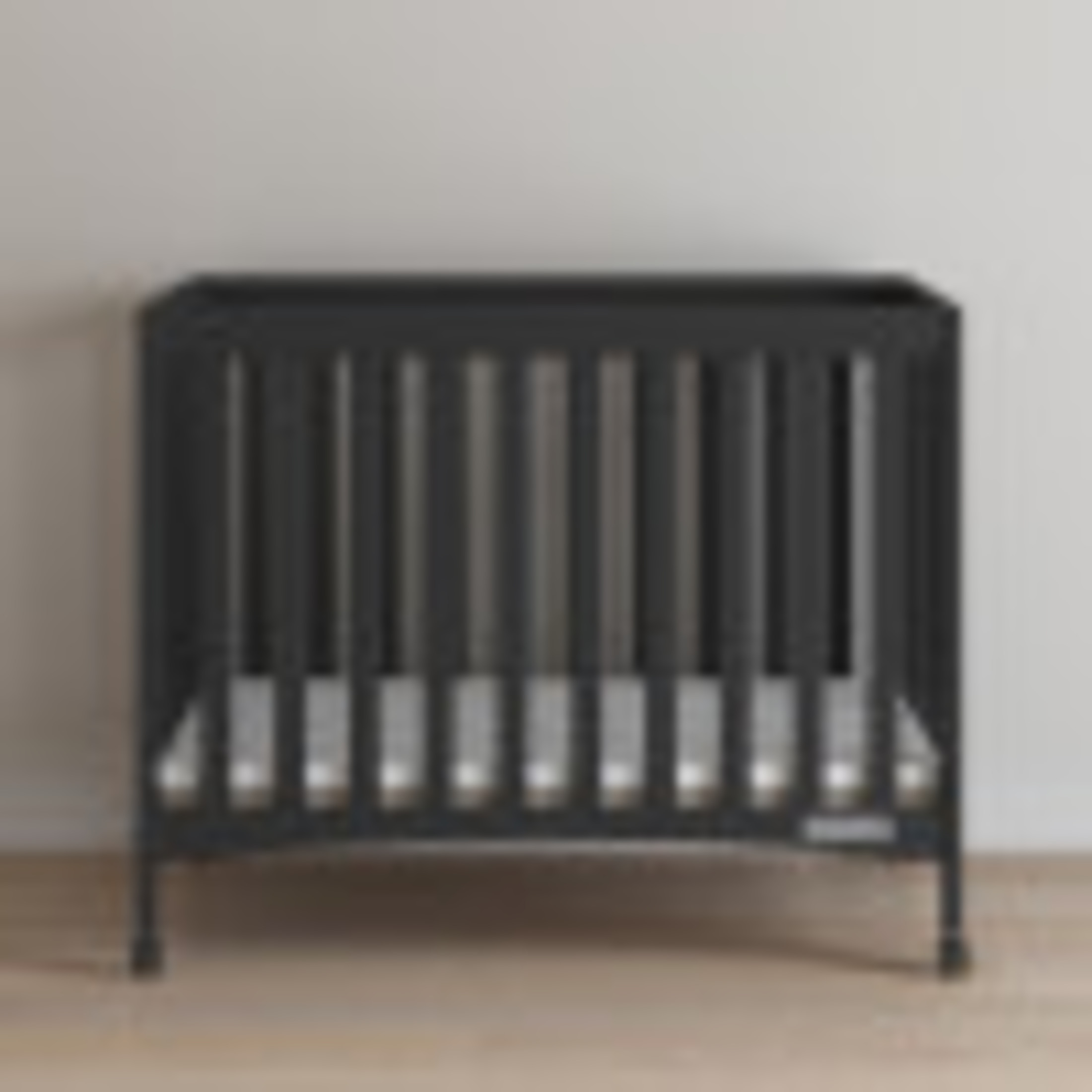 Child Craft London Folding Portable Mini Crib with 2-inch Mattress, Ebony