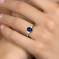thumbnail image 4 of Gem Stone King 10K Yellow Gold Blue Created Sapphire and White Created Sapphire Engagement Ring for Women | 2.10 Cttw | Oval 8X6MM | Gemstone September Birthstone | Size 5, 4 of 6