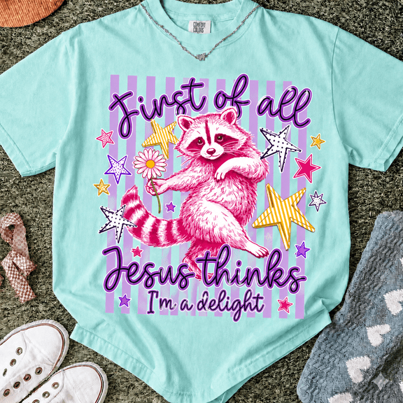 First of All Jesus Thinks I’m a Delight Comfort Colors Shirt, Cute Christian Raccoon Graphic Tee, Faith Gift for Women