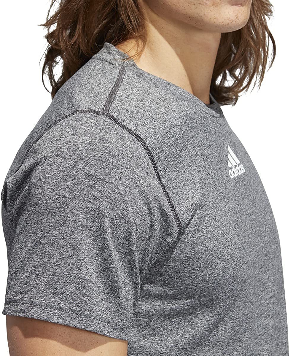 Made from 100% polyester single jersey, the Adidas Team Creator Short-Sleeve Tee is lightweight and breathable, making it perfect for any type of physical activity. Available in a medium gray and white color, this premium athletic shirt is a must-have for fitness enthusiasts looking for a flawless fit and maximum comfort. Whether you're hitting the gym or going for a run, this tee will keep you dry and focused, allowing you to move effortlessly and effectively during your workout. Stay comfortable and stylish with this top-of-the-line workout essential. Description by ChatGPT.