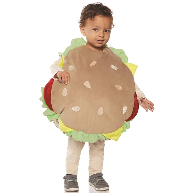 Disfraz Underwraps Hamburger Belly para bebés para niños pequeños multicolor, vista frontal centrada de cuerpo entero con niño pequeño usando un cuerpo de felpa circular estilo panecillo con semillas y capas verdes y rojas que simulan lechuga y tomate, cierres de velcro visibles; solo incluye el cuerpo, adecuado para sesiones de fotos y fiestas de disfraces.