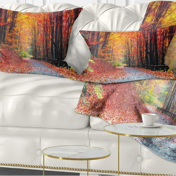 Designart Road in Beautiful Autumn Forest - Modern Forest Throw Pillow - 12x20