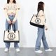 thumbnail image 1 of Bolsa Bolso de lona con letras para mujer, bolso de mano de compras de hombro simple de Color Hit (R) Tmvgtek Para estrenar, 1 of 9