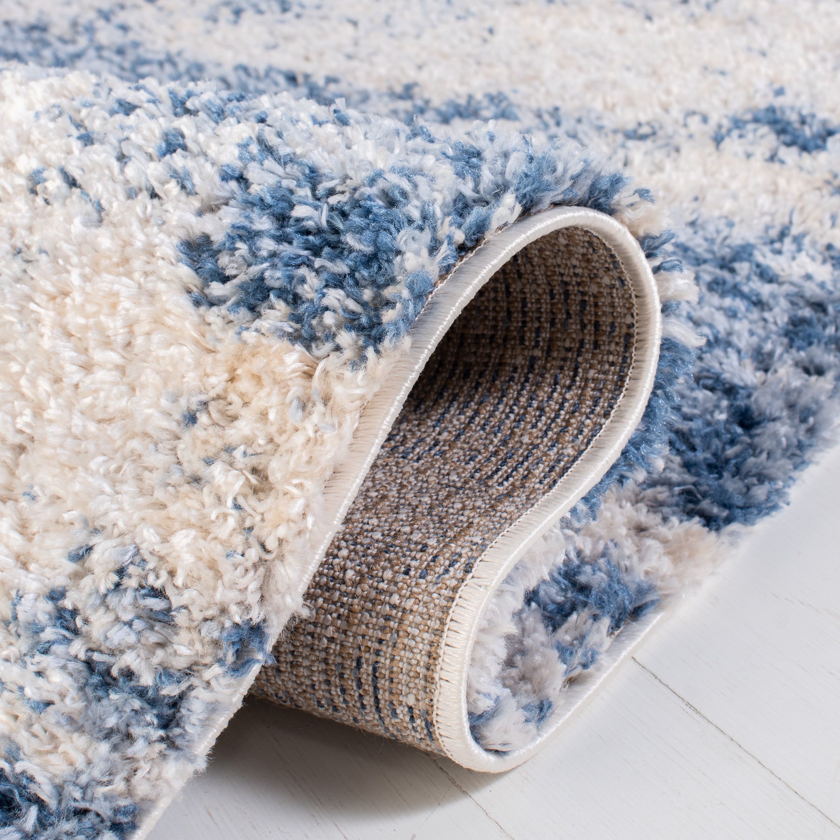 SAFAVIEH Berber Damian Abstract Shag Area Rug, Beige/Blue, 5'3" x 7'6"