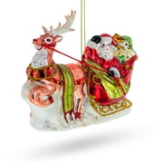 Santas Sleigh Ride with Reindeer Glass Christmas Ornament