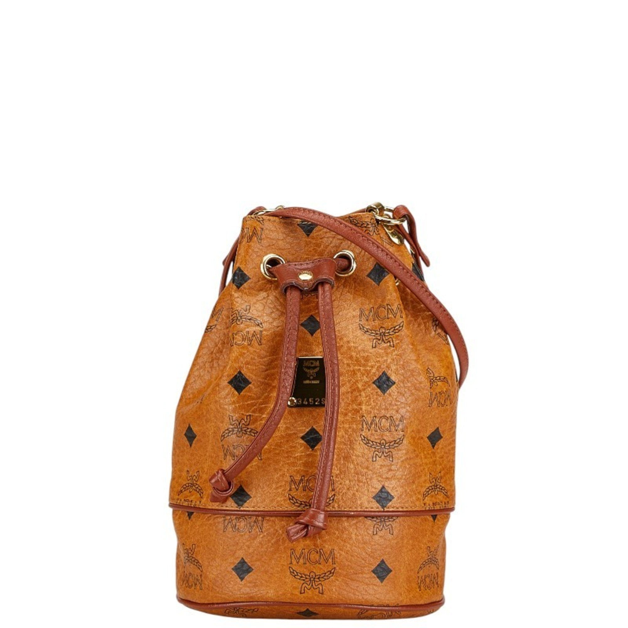 Vintage MCM ~ Brown Logo Nylon Drawstring Sling Backpack Bag ~ Hand Made MCM Backpack Bag Backpack Cognac Brown Black Gold Vintage  main image 2