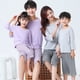 thumbnail image 4 of Una familia de cuatro padres e hijos usan ropa de hogar modal con aire acondicionado, pijama de pantalones cortos a cuadros de manga tres cuartos para niños medianos y grandes., 4 of 6