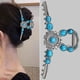 thumbnail image 2 of Pinza para el pelo estilo western de metal con diseño de sol azul turquesa extragrande, 2 of 4