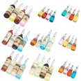 thumbnail image 1 of 24 colgantes grandes de resina con etiquetas para botellas de vino, 12 estilos, al azar, con aro, para pendientes, collares y llaveros., 1 of 9