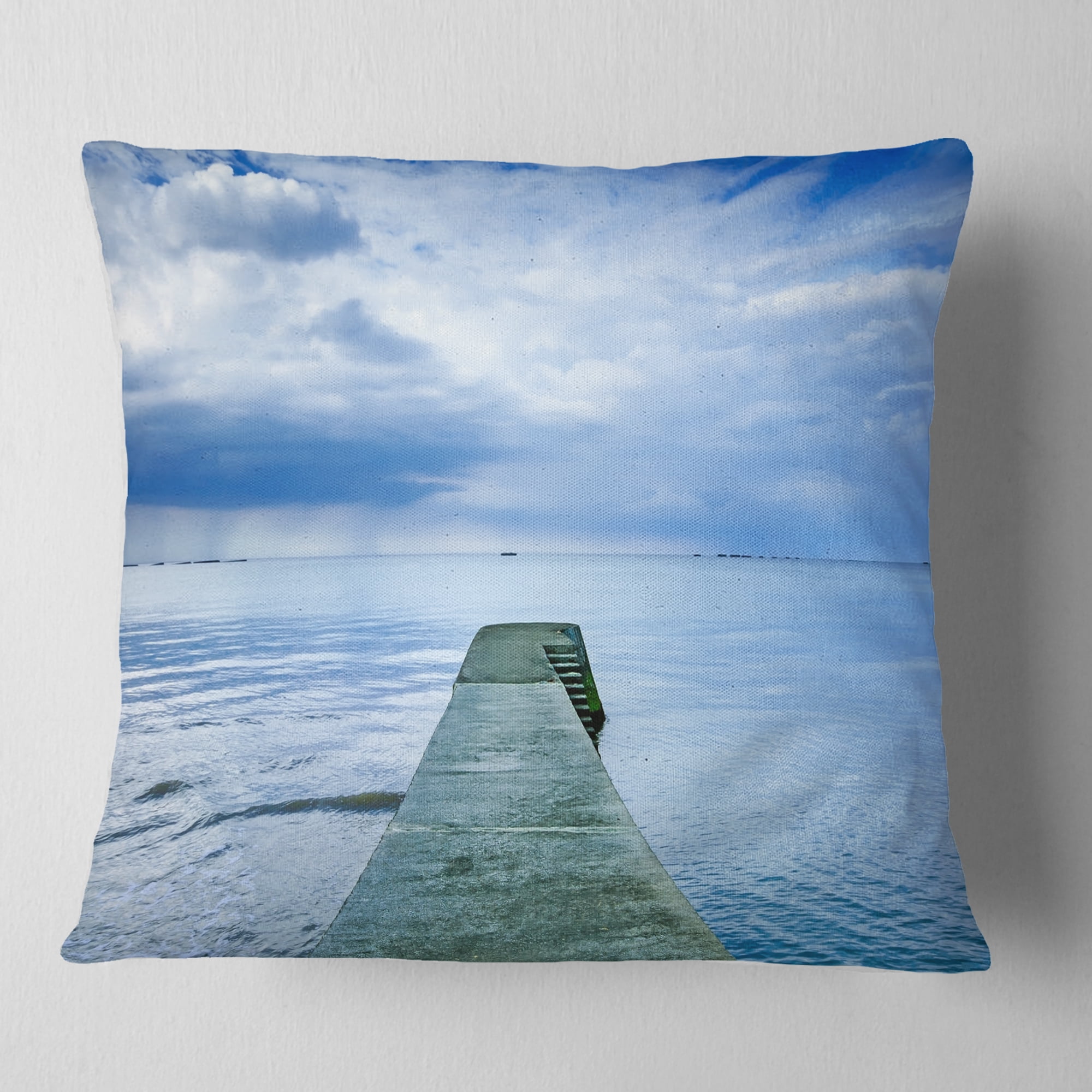 Designart Concrete Pier Under Cloudy Sky - Seascape Throw Pillow - 16x16