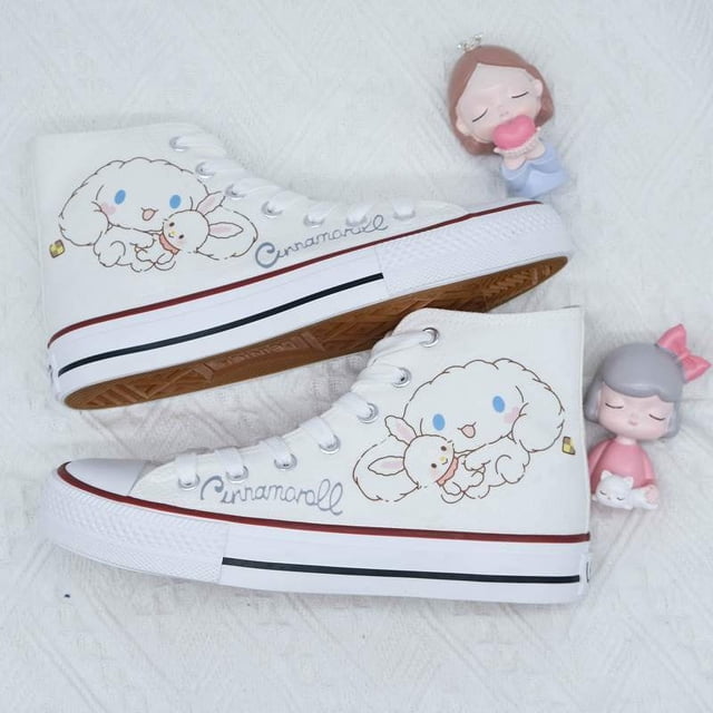 2025 zapatos blancos de verano y otoño nuevo estilo jade canela perro zapatos de lona de caña alta para niñas y niñas corazón ins graffiti versión coreana tendencia versátil
