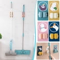 thumbnail image 1 of Gancho para Trapeador Que No Deja Marcas | Soporte de Pared Adhesivo Resistente para Trapeadores y Escobas | No Requiere Taladro | Soporta Hasta 5 Kg | Organizador para Baño y Cocina, 1 of 5