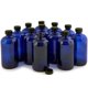 thumbnail image 1 of Vivaplex 12 botellas de vidrio con tapa azul cobalto de 16 oz, 1 of 1