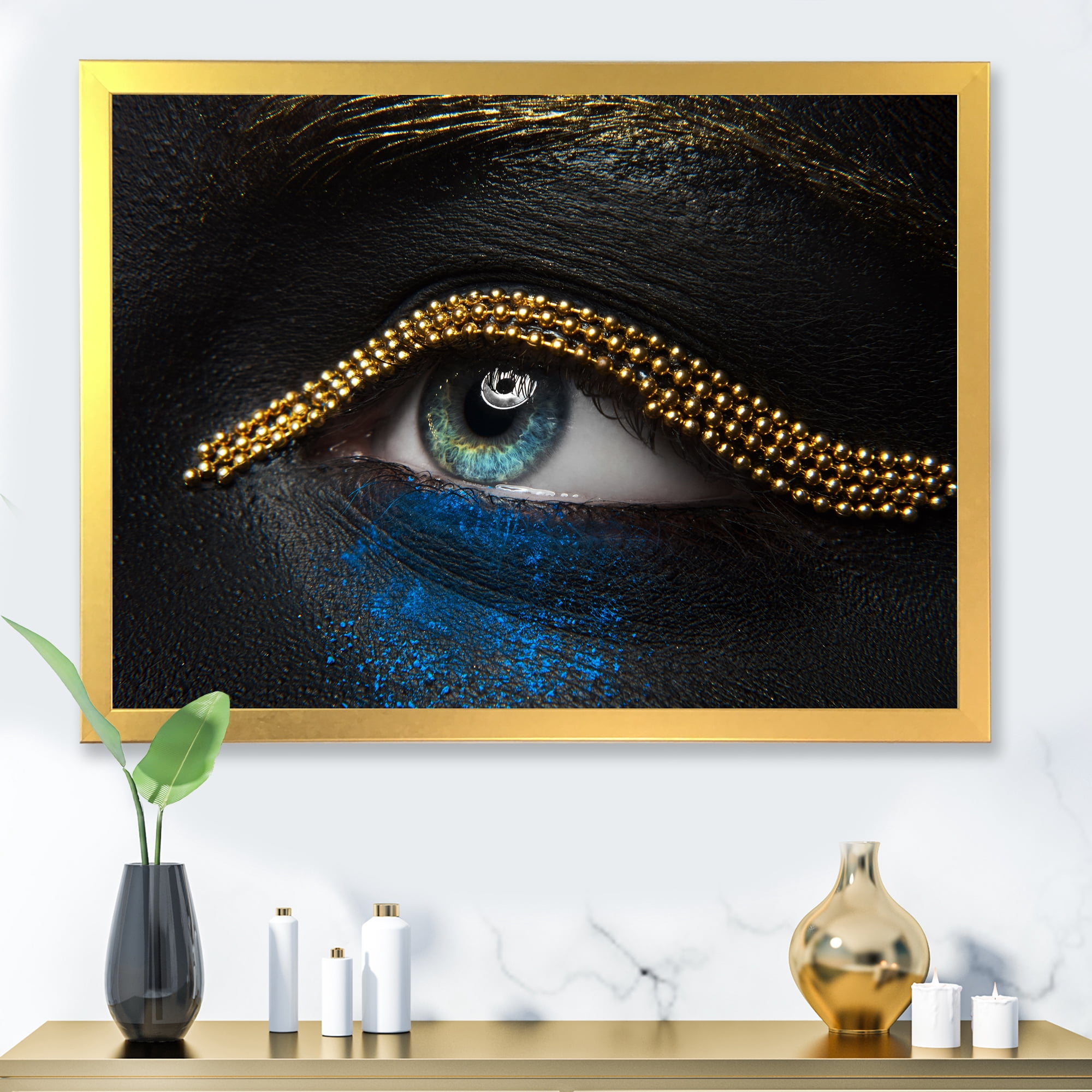 Designart 'Woman Eyes With Black Skin With A Gold Chain' Modern Framed Art Print