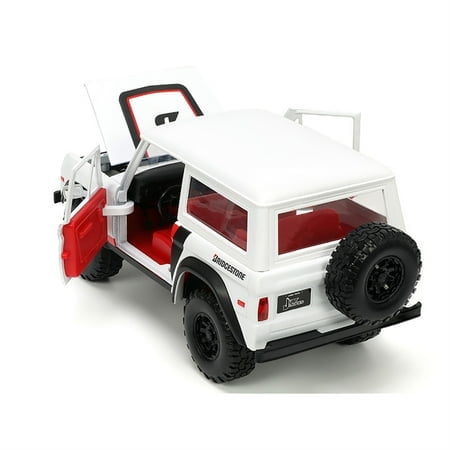1973 Ford Bronco #008 White with Red and Black Stripes and Red Interior with Extra Wheels "Just Trucks" Series 1/24 Diecast Model Car by Jada