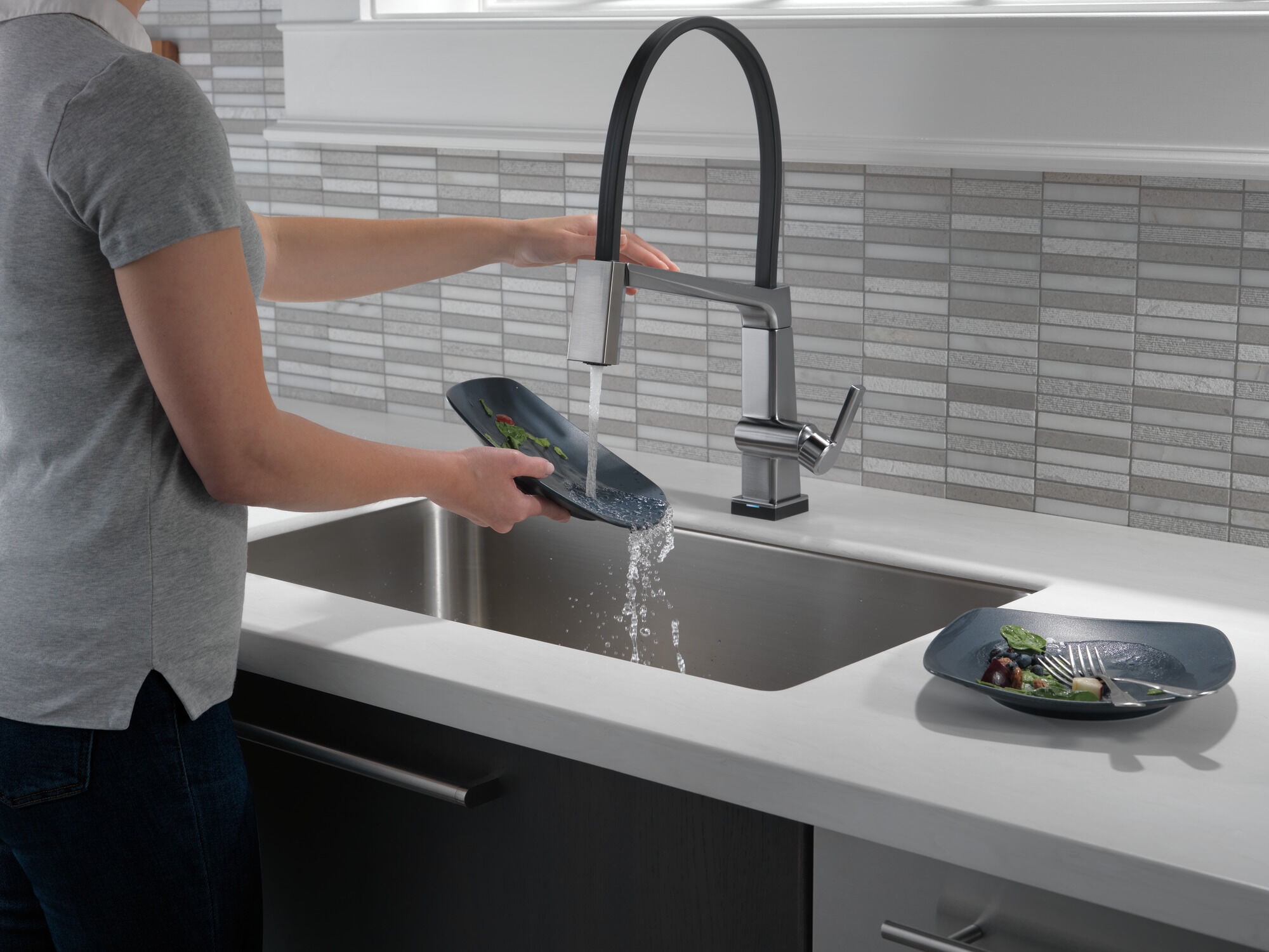 Delta Pivotal™ Single Handle Exposed Hose Kitchen Faucet with Touch2O Technology