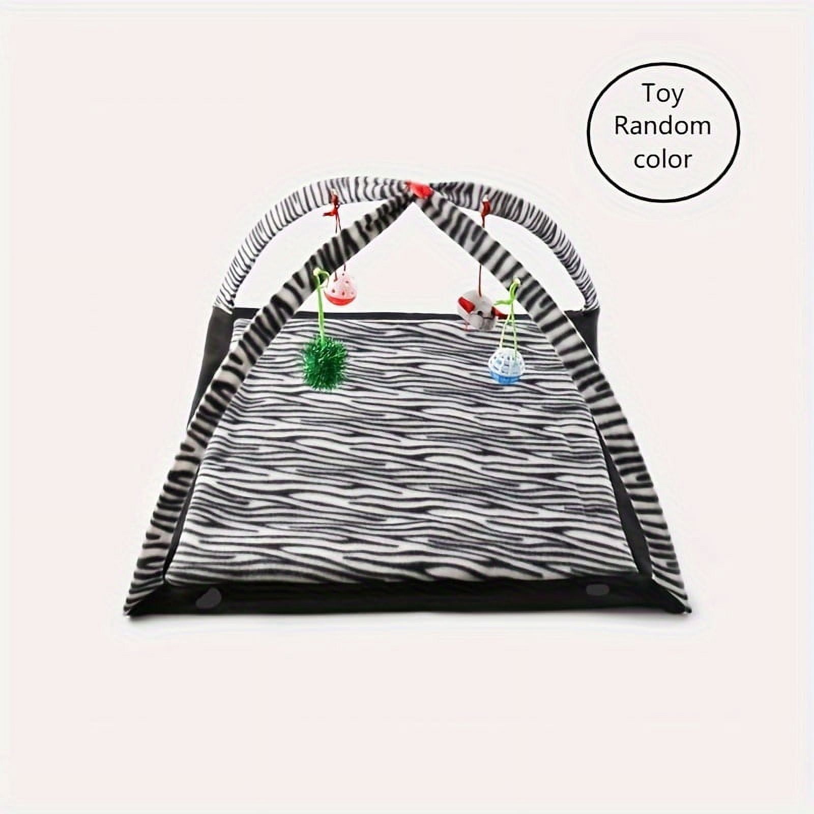 Interactive cat toy rocking activity mat for playing with cats, featuring a scratching area, hanging toys, and rolling balls