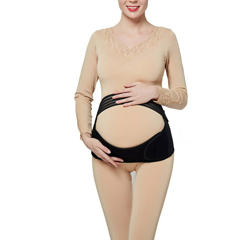 Premium Photo  Portrait of pregnant woman in underwear wearing pregnancy  belt at blue surface with copy space. orthopedic abdominal support belt  concept.