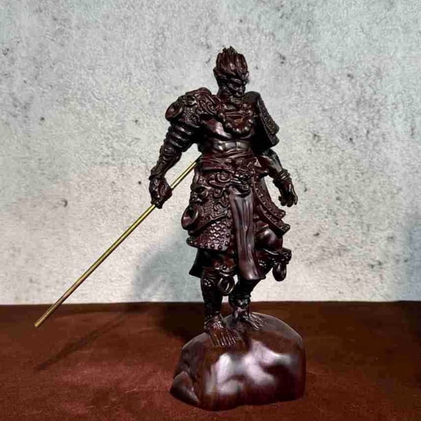 Ebony wood carving of Sun Wukong (the Monkey King) figurine, a popular item featured in live streams, and a desktop ornament.