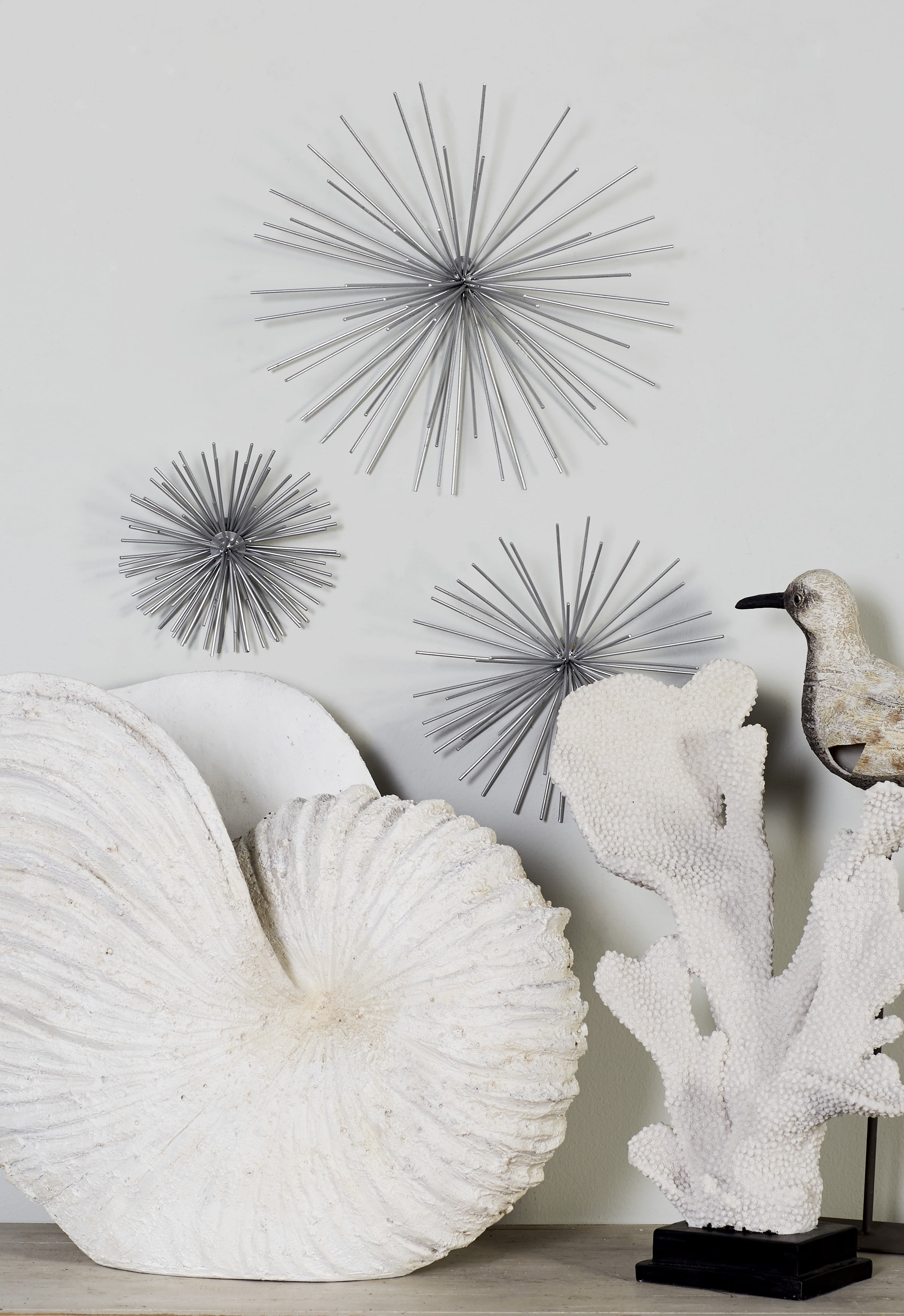 CosmoLiving by Cosmopolitan Contemporary 3D Silver Metal Starburst Wall Decor, Set Of 3, 6" x 3