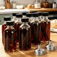 thumbnail image 5 of ACDANC 12 Pack 2 Oz Small Clear Glass Bottles with Lids&2 Funnels-60Ml Boston Round Sample Bottles for Potion,Juice,Ginger Shots,Oils,Whiskey,Wellness Shots,Mini Travel Bottles, 5 of 6