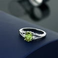 thumbnail image 5 of Gem Stone King 1.50 Cttw Green Peridot and White Topaz 3-Stone Ring for Women | 925 Silver | Gemstone Birthstone | Oval 8X6MM | Three Stone Wedding Engagement Anniversary Promise Ring | Size 8, 5 of 5