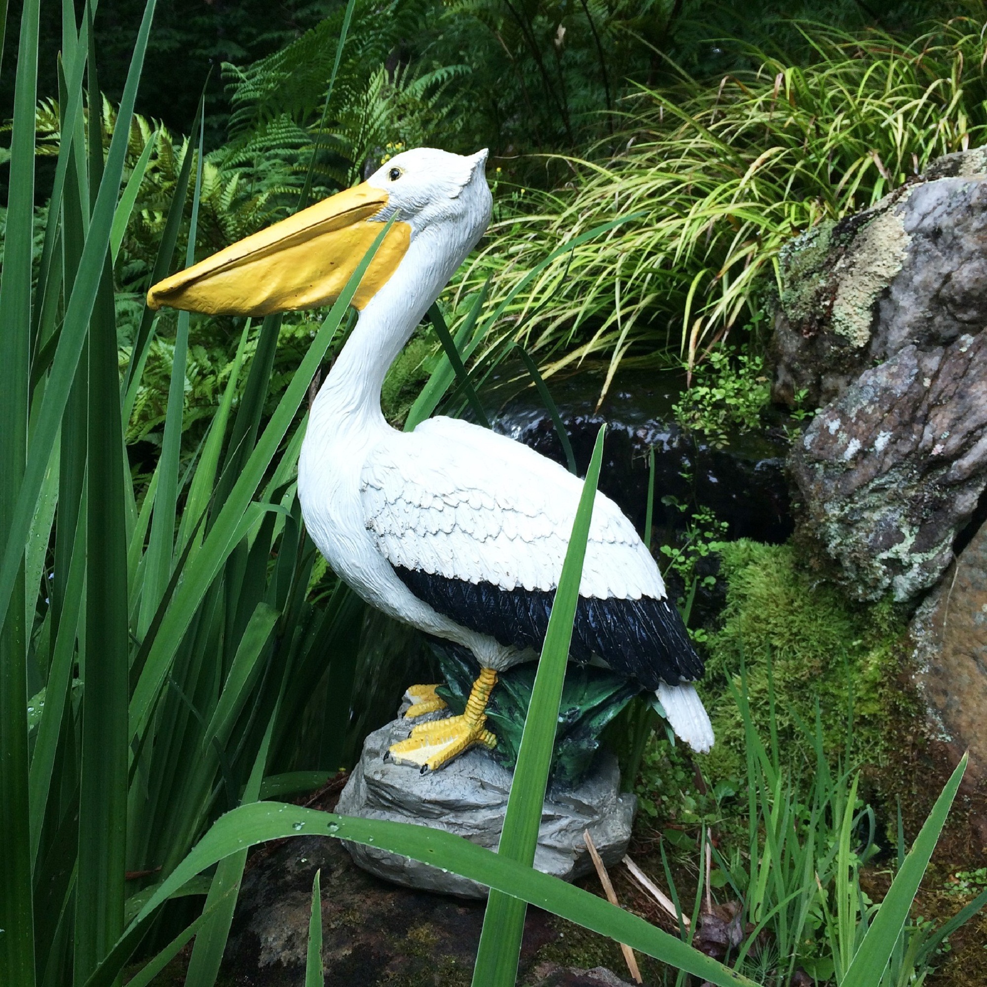 Homestyles 20 in. Pelican on Coastal Rock with Natural Finish Nautical Beach Statue Garden Statue