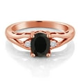 thumbnail image 2 of Gem Stone King 18K Rose Gold Plated Silver Black Onyx and White Moissanite 3 Stone Engagement Ring for Women | 1.68 Cttw | Oval 8X6MM | Round 2MM | Gemstone December Birthstone | Size 7, 2 of 5