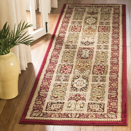 SAFAVIEH Lyndhurst Josephine Traditional Runner Rug  Multi/Red  2 3  x 20 Lyndhurst Rug Collection. Luxurious EZ Care Area Rugs. The Lyndhurst Collection features luxurious  easy care  easy-maintenance area rugs made to add long lasting charm and decorative beauty even in the busiest  high traffic areas of the home. Hand tufted using a blend of soft yet durable synthetic yarns styled in traditional Persian florals  interwoven vines and intricate latticework. Use the Lyndhurst rugs in your home for an elegant and transitional upgrade.