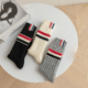 thumbnail image 2 of Otoño Invierno grueso cálido hombres mujeres terciopelo calcetines de tubo alto rayas calcetines de moda embalaje independiente estilo absorbente de sudor, 2 of 2