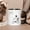 Black-11oz, variant on This ceramic mug features a unique "Distant Place" design. It is suitable for tea, coffee and milk, and makes a thoughtful gift for family and friends. Perfect for gifting on occasions including Chri