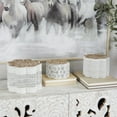 thumbnail image 2 of DecMode 8", 7", 6"W White Metal Quatrefoil Decorative Jars with Wood Carved Lids, 3-Pieces, 2 of 9