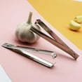thumbnail image 4 of Vxdvou Stainless Steel Garlic Peeler, Durable Garlic Peeler for Kitchen Use, Compact Kitchen Gadgets for Easy Garlic Skin Removal, Must-Have Kitchen Tool for Home Cooking, 4 of 9