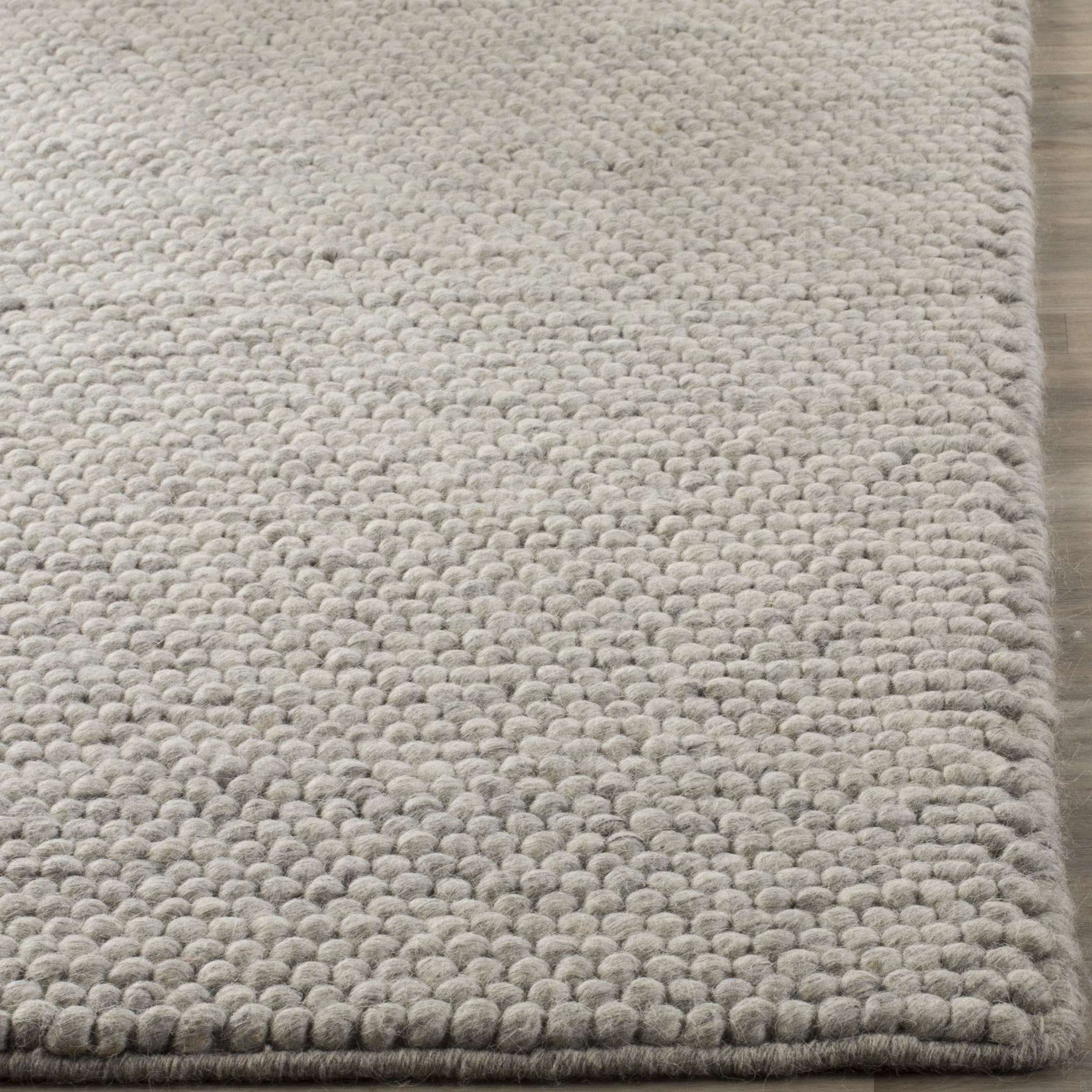 SAFAVIEH Natura Feride Solid Braided Wool Area Rug, Silver, 8' x 10' - Large - Scandinavian Design, Silver, Handmade Wool Blend, Ideal for Living Room, Bedroom, Dining Space