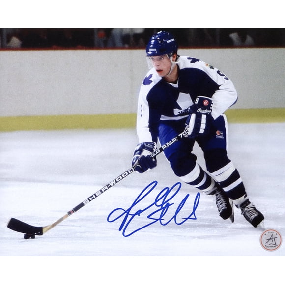 Russ Courtnall Autographed Toronto Maple Leafs Puck Rush 8x10 Photo