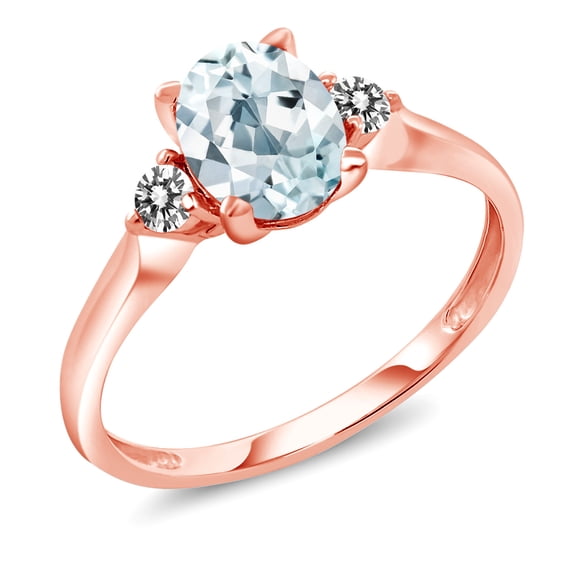 Gem Stone King 10K Rose Gold Sky Blue Aquamarine and White Diamond 3 Stone Engagement Ring for Women (1.26 Cttw, Oval Gemstone Birthstone, Size 6)