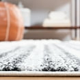 thumbnail image 4 of SAFAVIEH Moroccan Tassel Cainneach Geometric Shag Area Rug, Dark Grey/Ivory, 6'7" x 9'2", 4 of 8