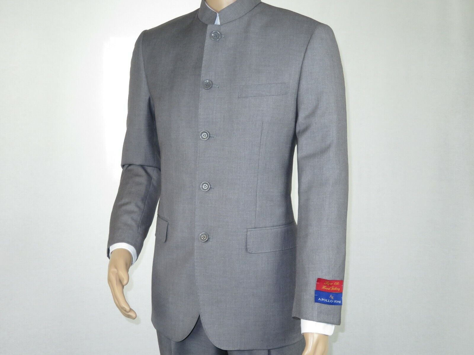 Apollo-King Ag91 Mandarin Men's Suit Jet Black perfect for Church is  Single Breasted Suit with 9 button closure in 3 button spaced pattern. The  No Collar Suit has epaulet strap on the