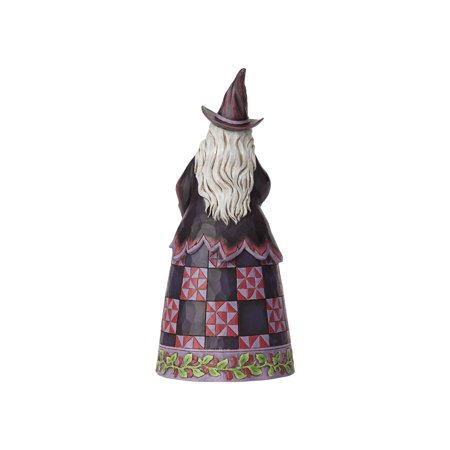 jim shore witch on pumpkin