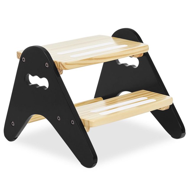 Dream On Me Skyward two-step kids stool with natural wood steps, anti-slip strips, and black side supports with handle cutouts.