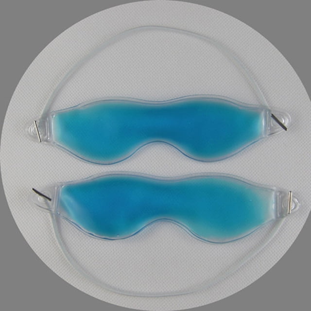 mascarilla de gel frío para ojos, calor cálido, ojos cansados, dolor de cabeza, gafas azules para dormir — dos mascarillas de gel azul 16 x 5 cm, vista frontal centrada; funda plástica transparente con gel azul translúcido, forma curva para los ojos con puente nasal y banda elástica ajustable visible; presentadas sobre fondo neutro, a menudo usadas como compresa fría o caliente para descanso.
