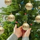 thumbnail image 5 of Juego de 6 Adornos Navideños: Bolas Pequeñas de 6 Cm con Diseño de Casita, Chapadas En Oro, de Plástico Irrompible, Ideales para Colgar En El Árbol o Decorar Cualquier Espacio., 5 of 6