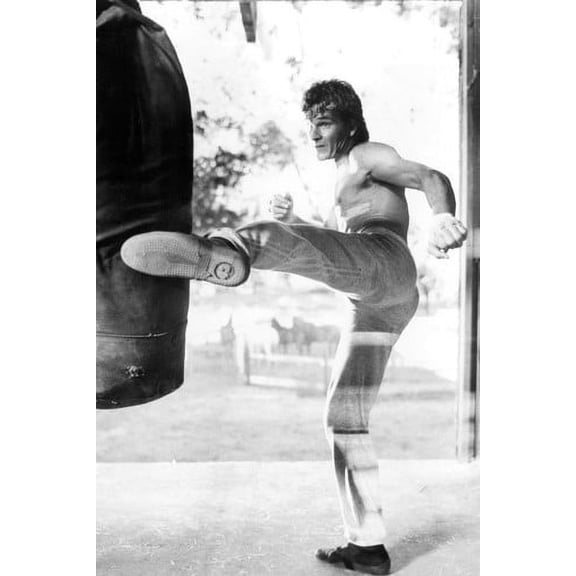Patrick Swayze bare chested kicks punchbag cool pose Roadhouse 24X36 Poster