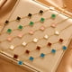 thumbnail image 5 of Pulsera de trébol Heldig de acero de titanio con incrustaciones de concha colgante, 5 of 6