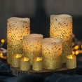 thumbnail image 1 of Velas LED Furora LIGHTING doradas con Mando a Distancia y Temporizador, Juego de 8 Votivas de Cera R, 1 of 9