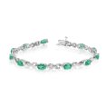 thumbnail image 1 of 10K White Gold Oval Emerald Stones And Diamonds Tennis Bracelet, 7", 1 of 1